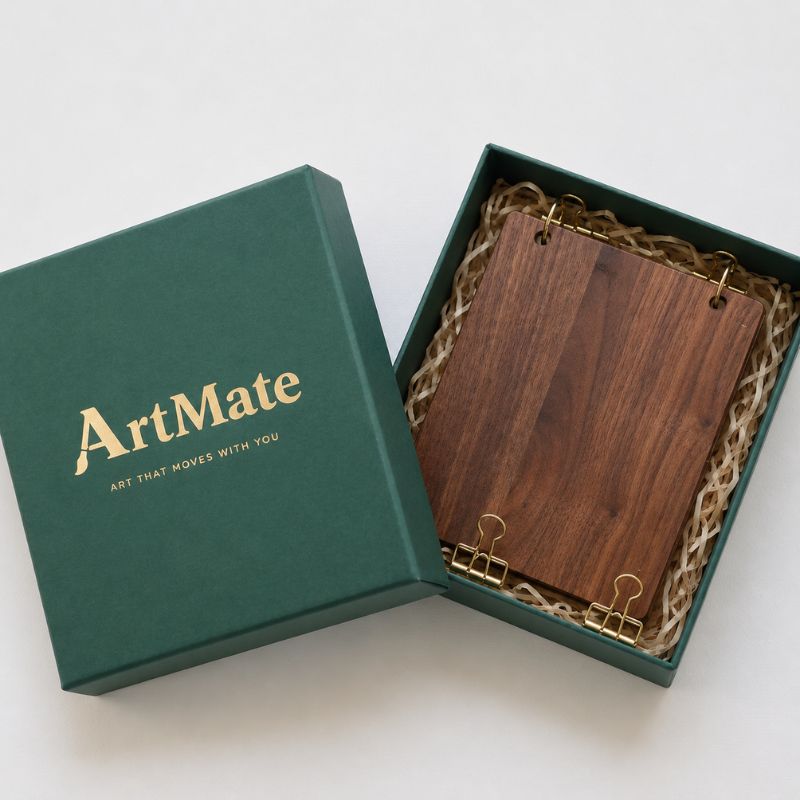 Walnut art journal packaged in a kraft gift box with shredded paper filling
